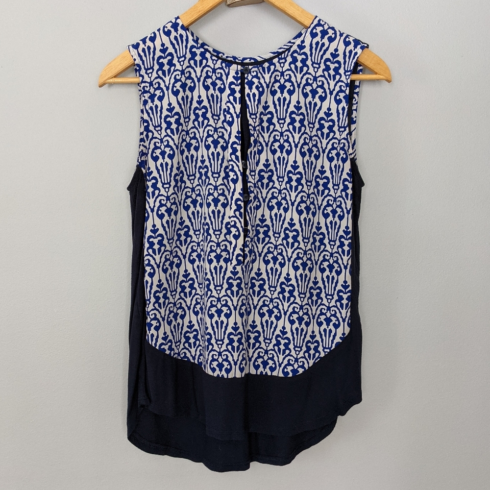 Sleeveless blue and white top